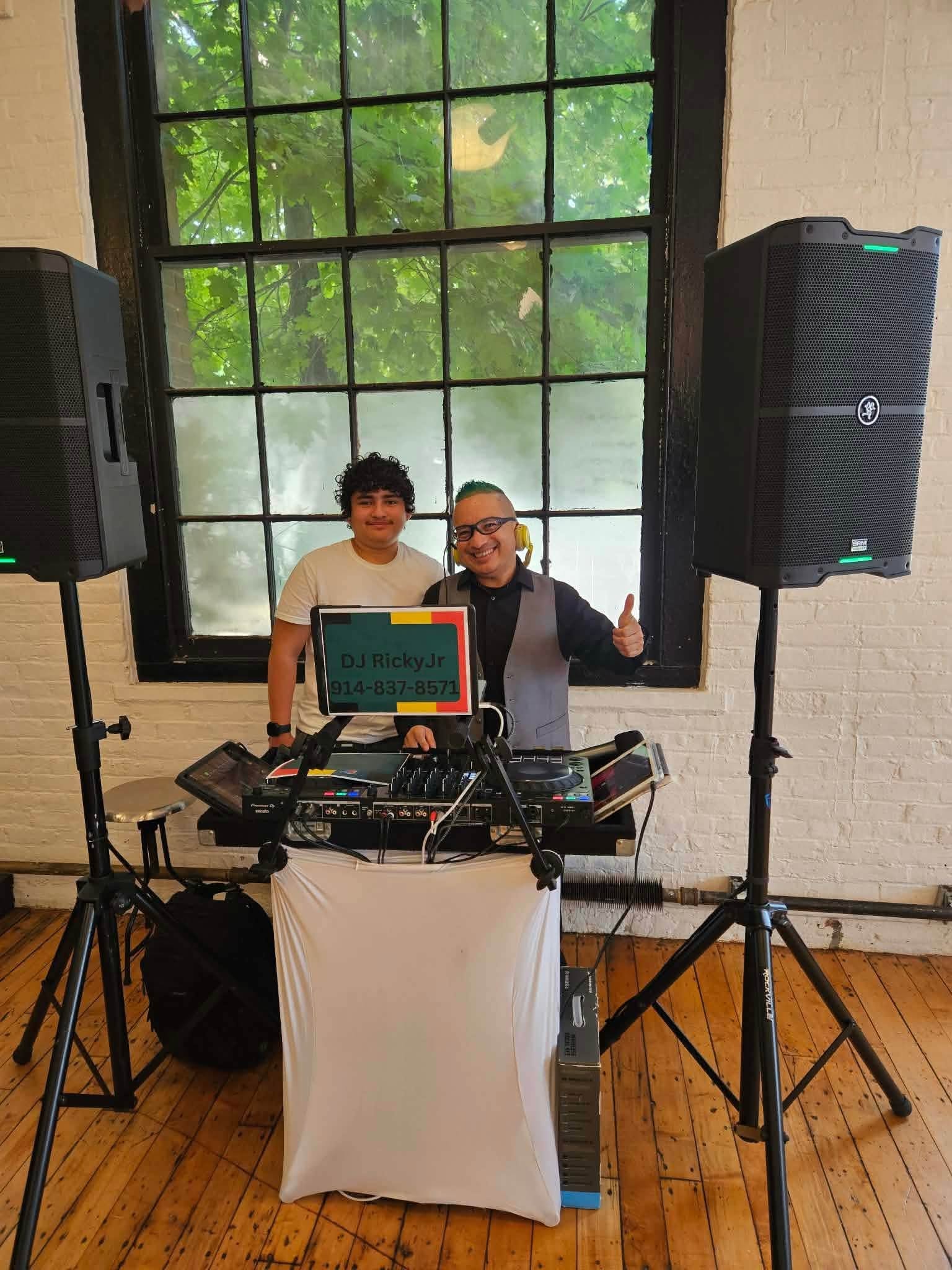 DJ Ricky Jr at the turntables at the fundraiser