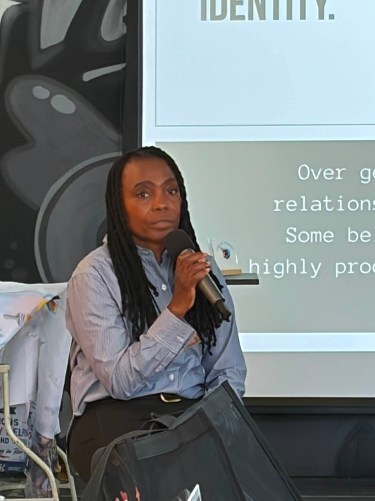 Speaker presenting at fundraiser event
