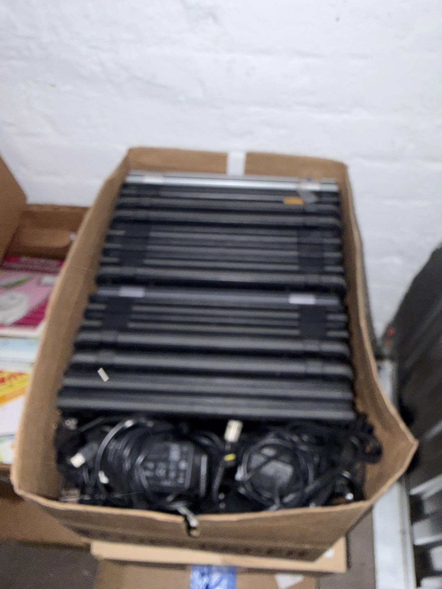 Box of donated laptops and computers packed for shipment to Nigeria